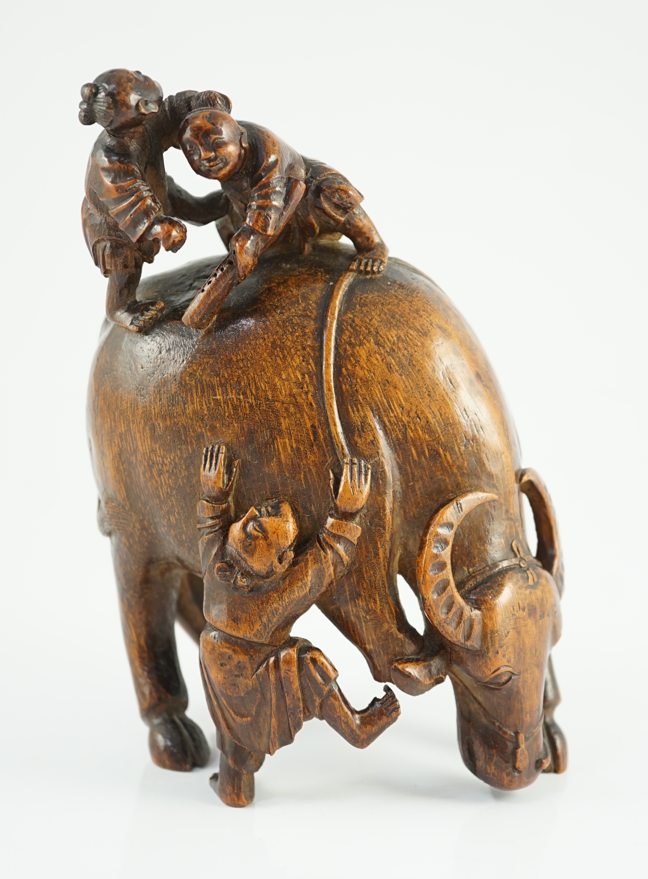 A Chinese bamboo ‘boys and buffalo’ group, 18th/19th century, 19.5cm high, one buffalo leg lacking